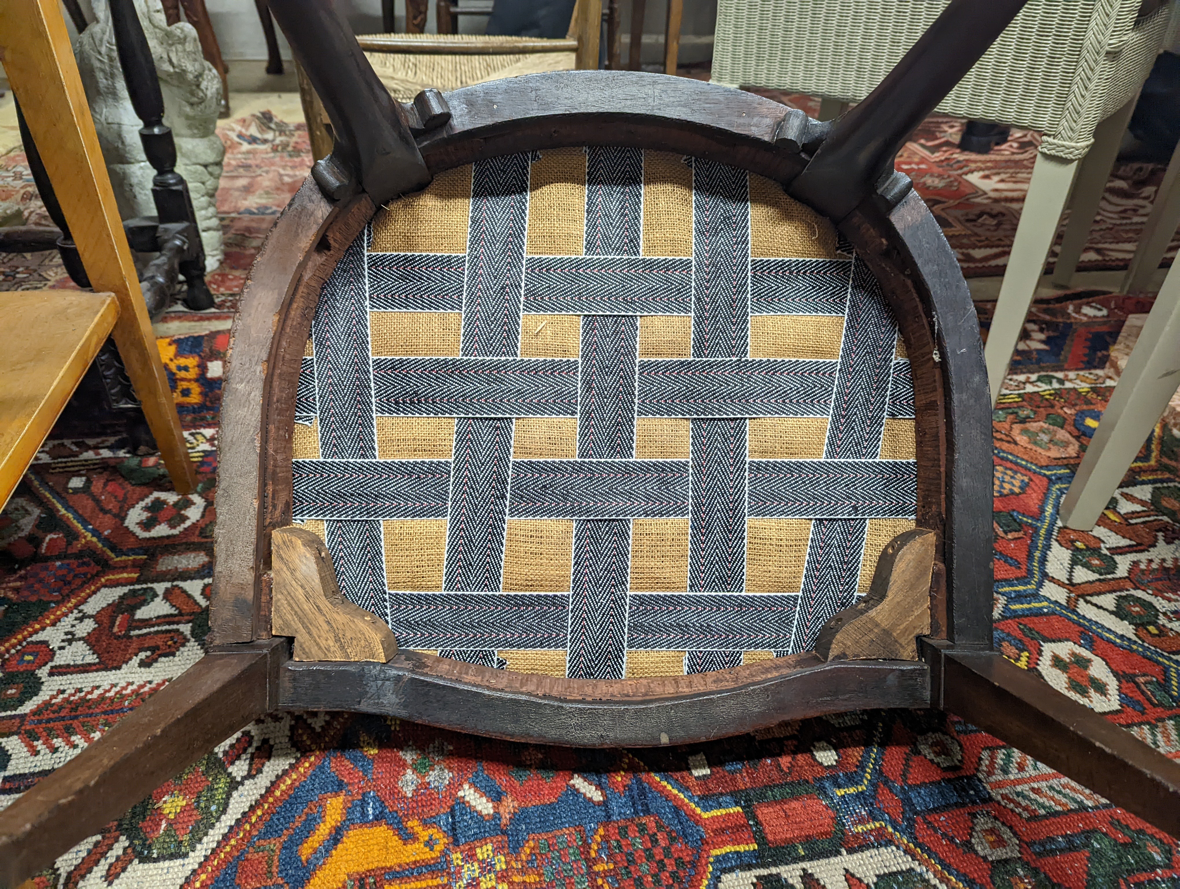 A pair of George III Hepplewhite style mahogany open armchairs, width 64cm, depth 50cm, height 92cm